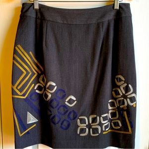 peter nygard skirt with machine embroidered designs and metal accents